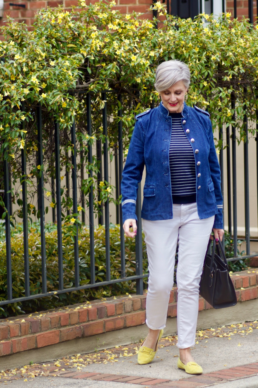 beth from Style at a Certain Age wears a Banana Republic stripe sweater, white denim and a jean jacket