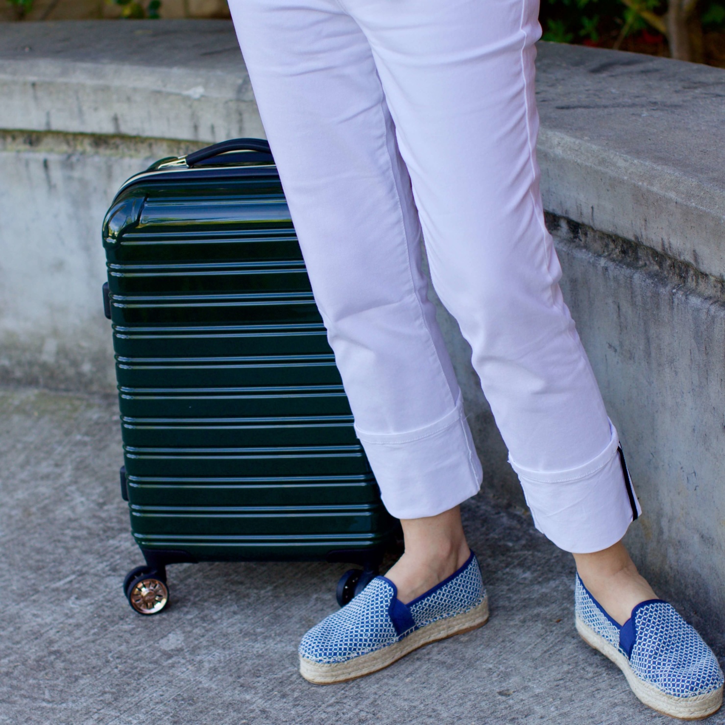 beth from Style at a Certain Age wears white denim, blue and white striped tee, platform espadrilles