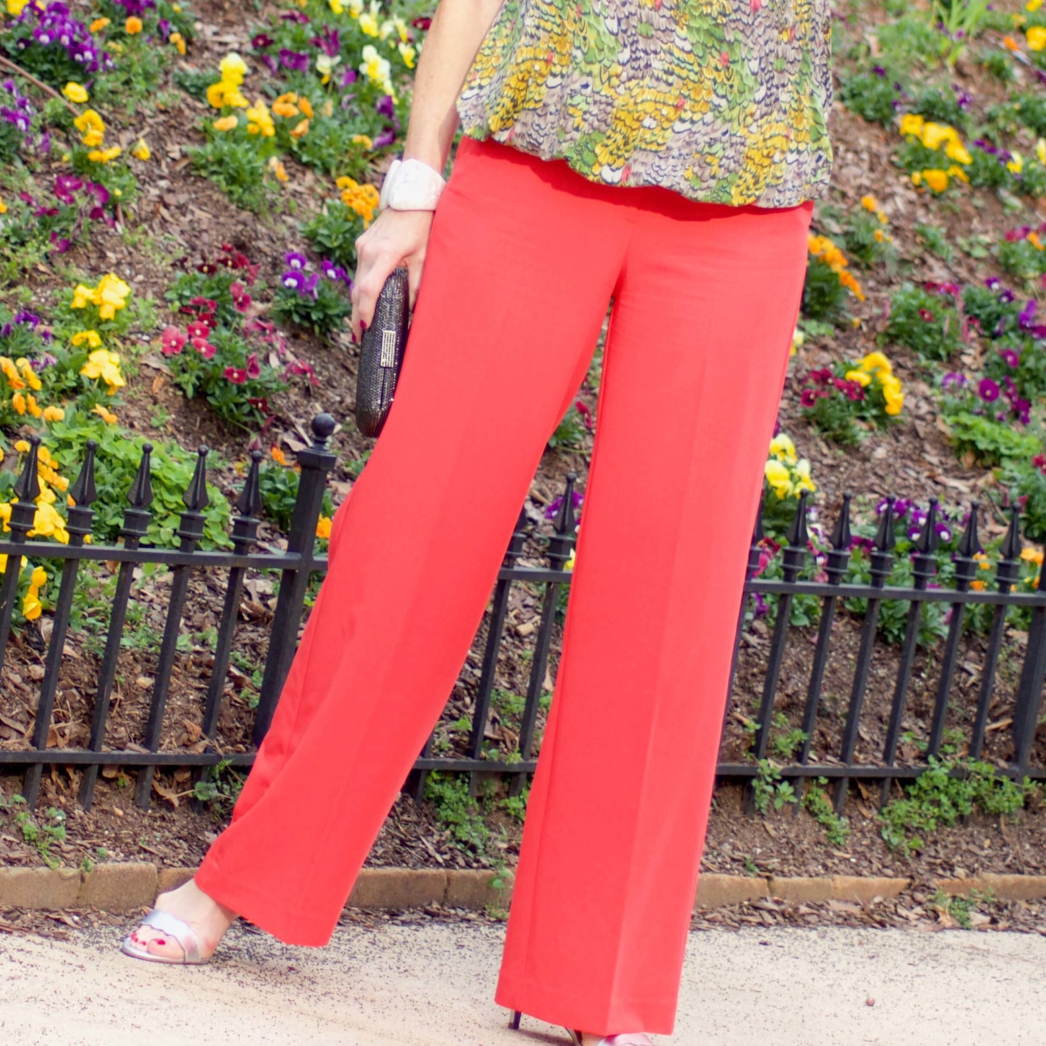 beth from Style at a Certain Age wears wide leg pants from JC Penney, and a sleeveless blouse