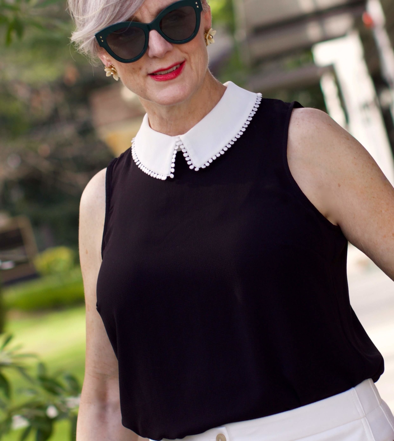 what to wear to work wide leg pants, black blouse, and suede sandals