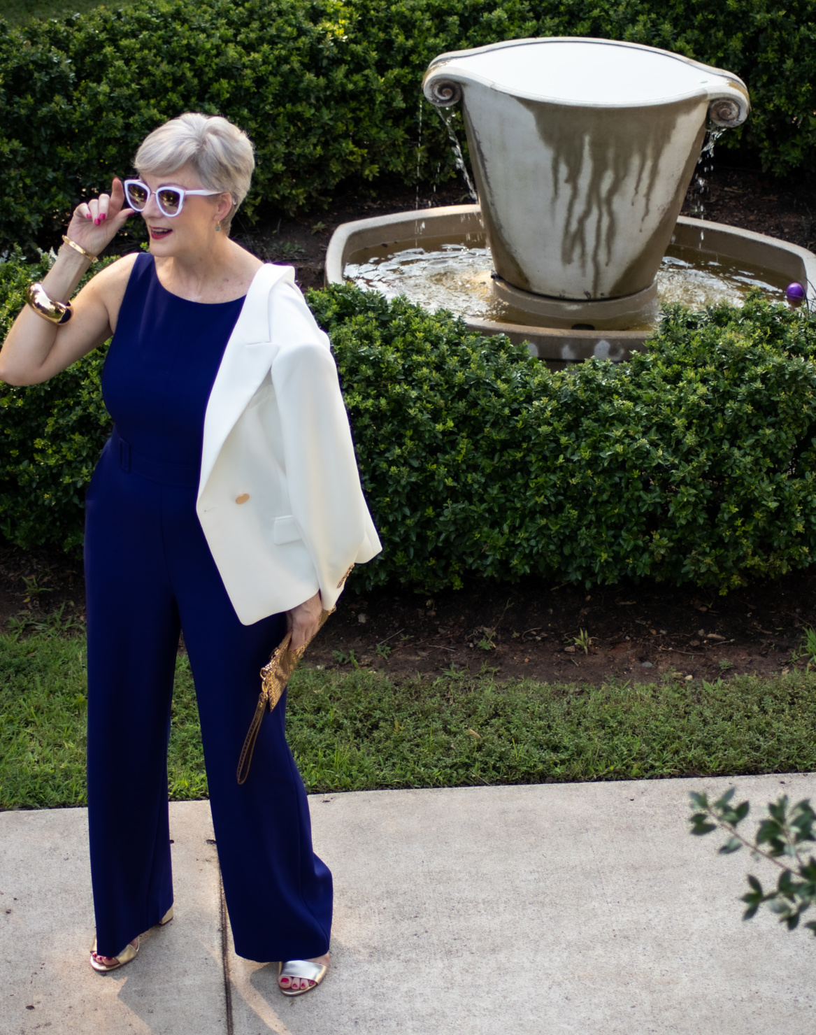 blue jumpsuit and white blazer
