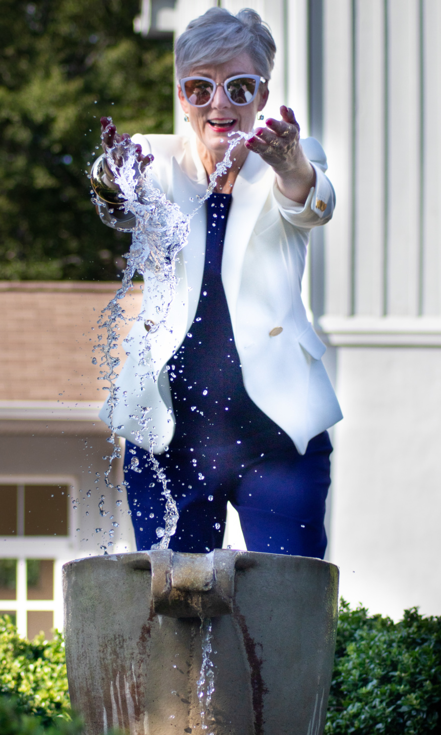 blue jumpsuit and white blazer
