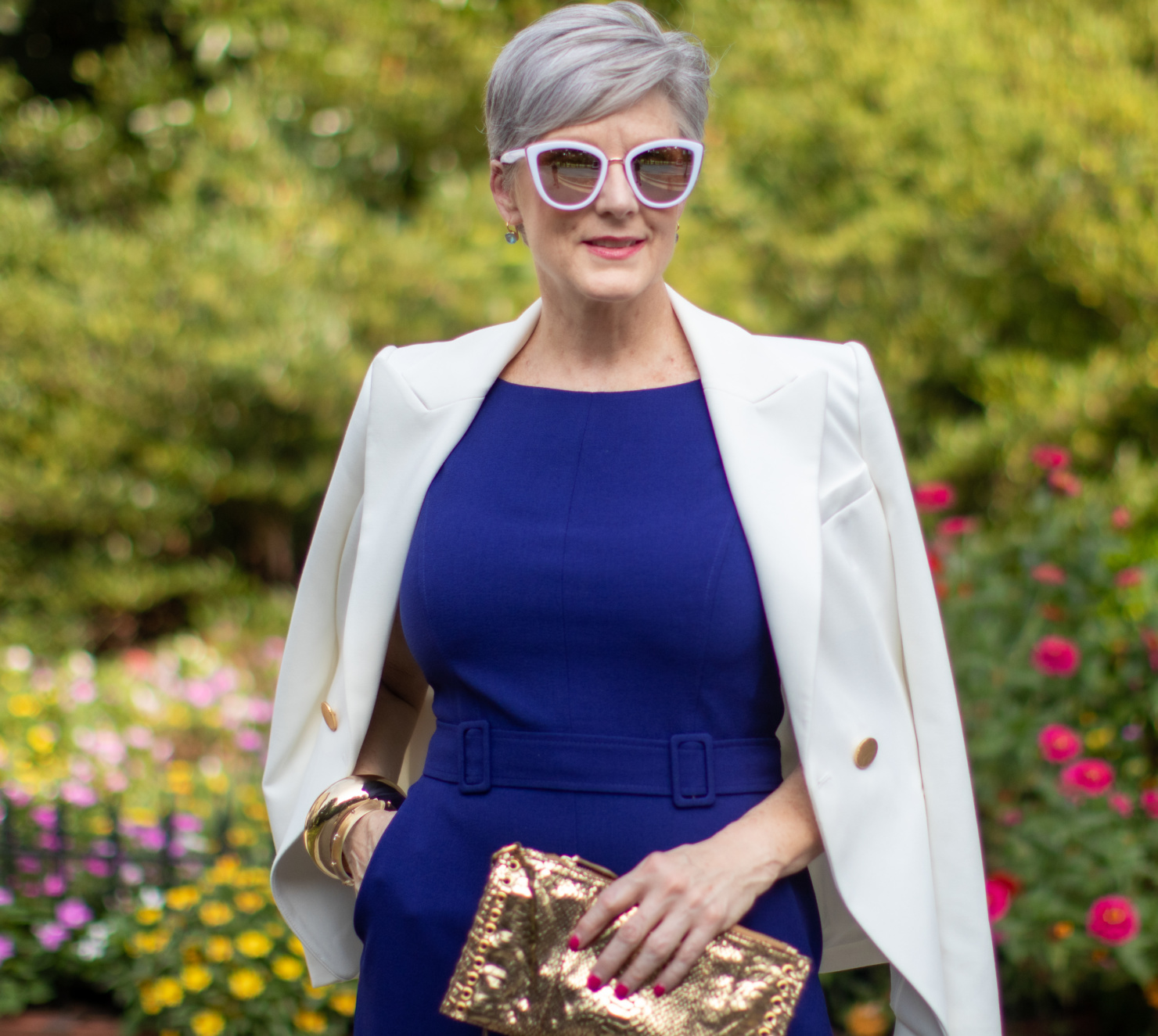 blue jumpsuit and white blazer