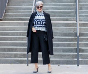 overcoats, sweaters, and wide-leg pants