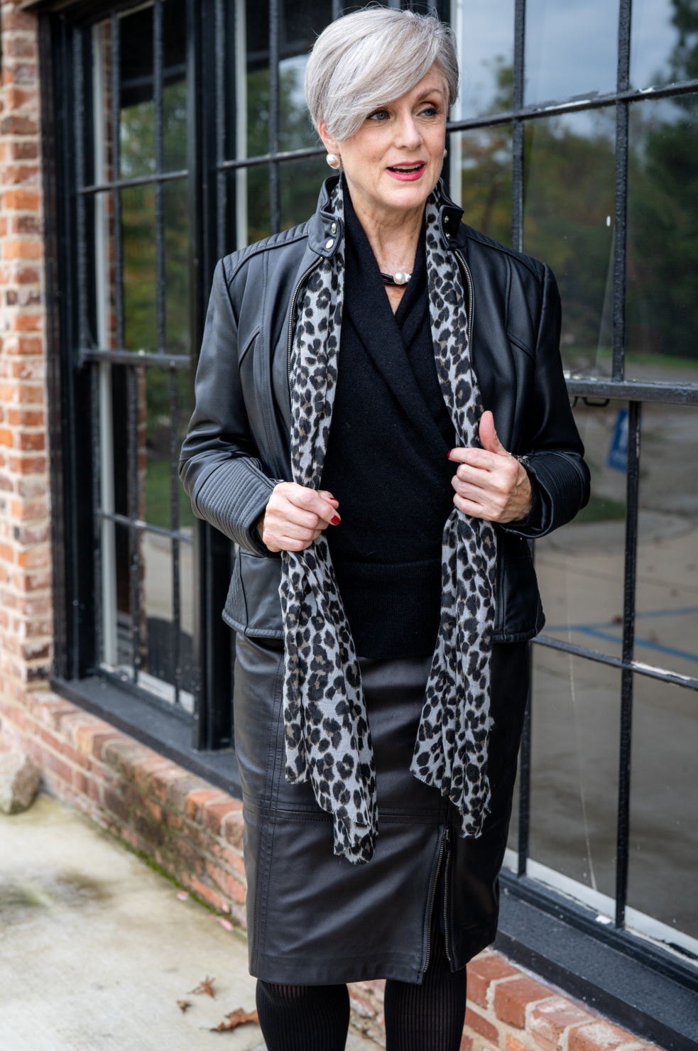 cashmere sweater, leather skirt and leopard scarf