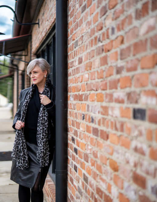cashmere sweater, leather skirt and leopard scarf