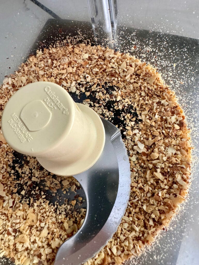 Toasted slivered almonds pulsed into coarse pieces in the Cuisinart food processor