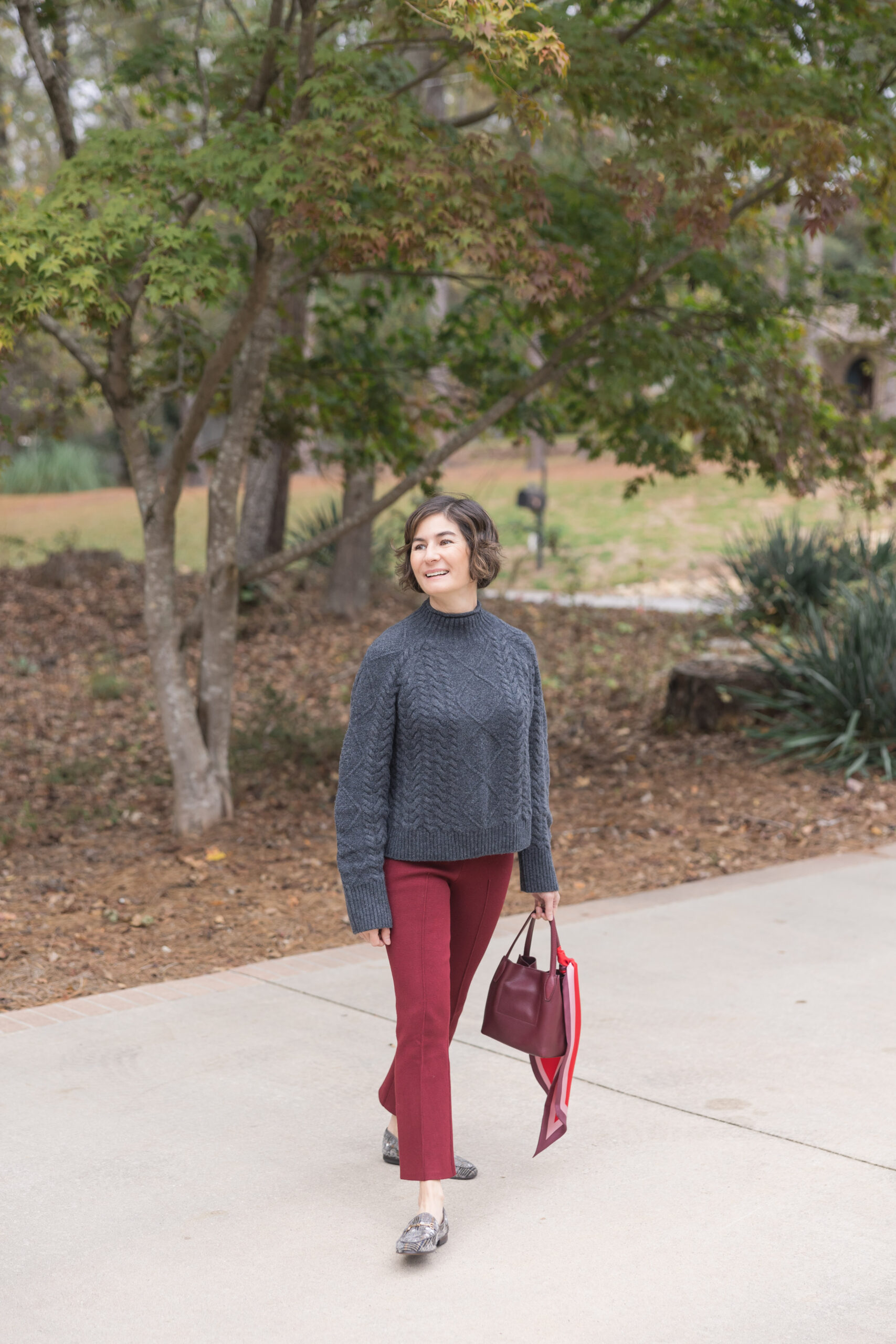 cable knit and red pants