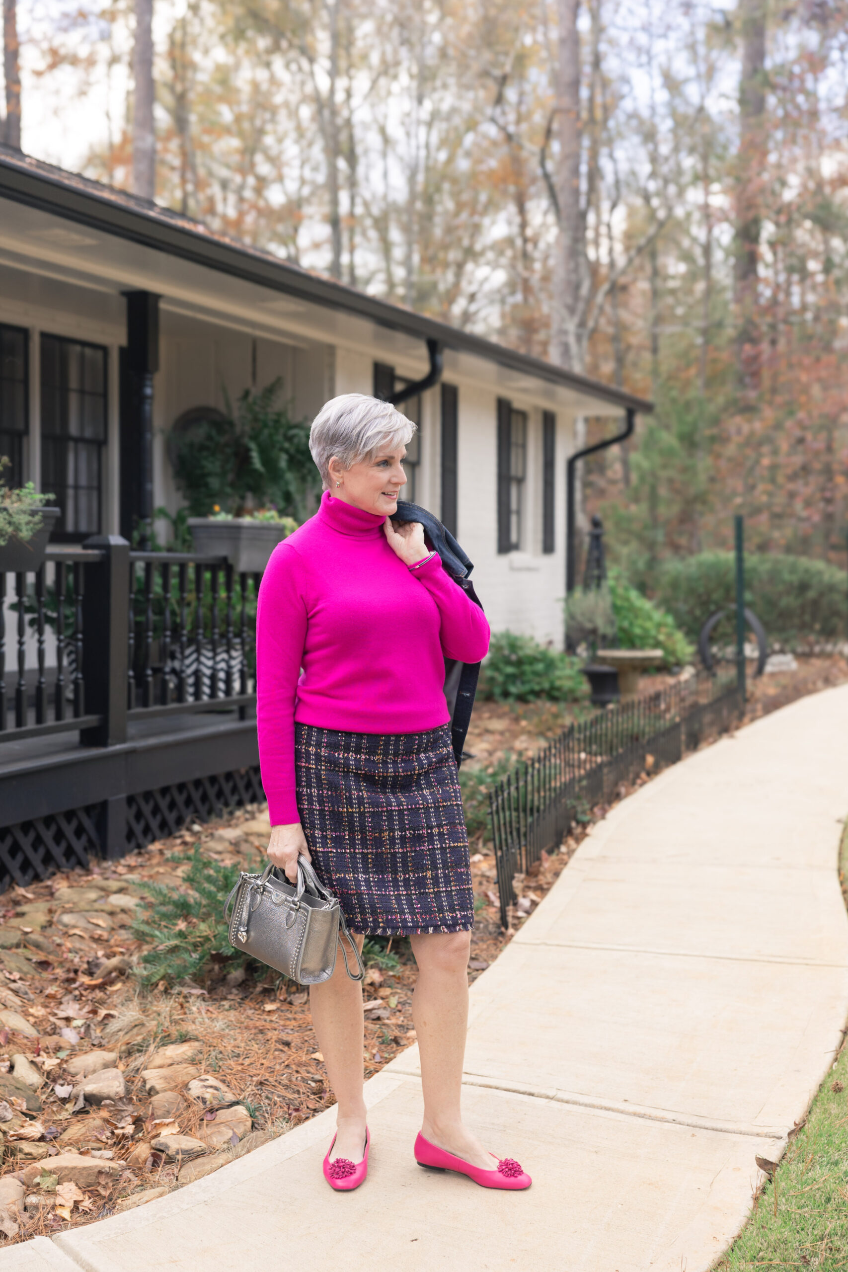hot pink turtleneck and tweed skirt