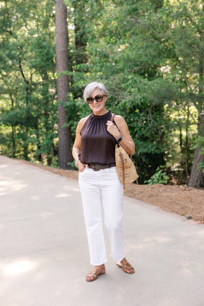 Beth Djalali in a polished outfit with statement earrings and bold accessories – everyday elegance for women over 50