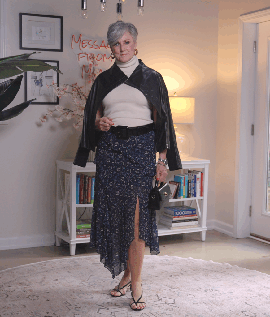 Paisley skirt styled with sleeveless turtleneck and moto jacket, feminine fall outfit idea
