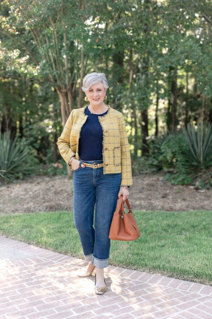 Timeless fall fashion look styled by Beth Djalali of Style at a Certain Age, pairing classic denim with a statement jacket.