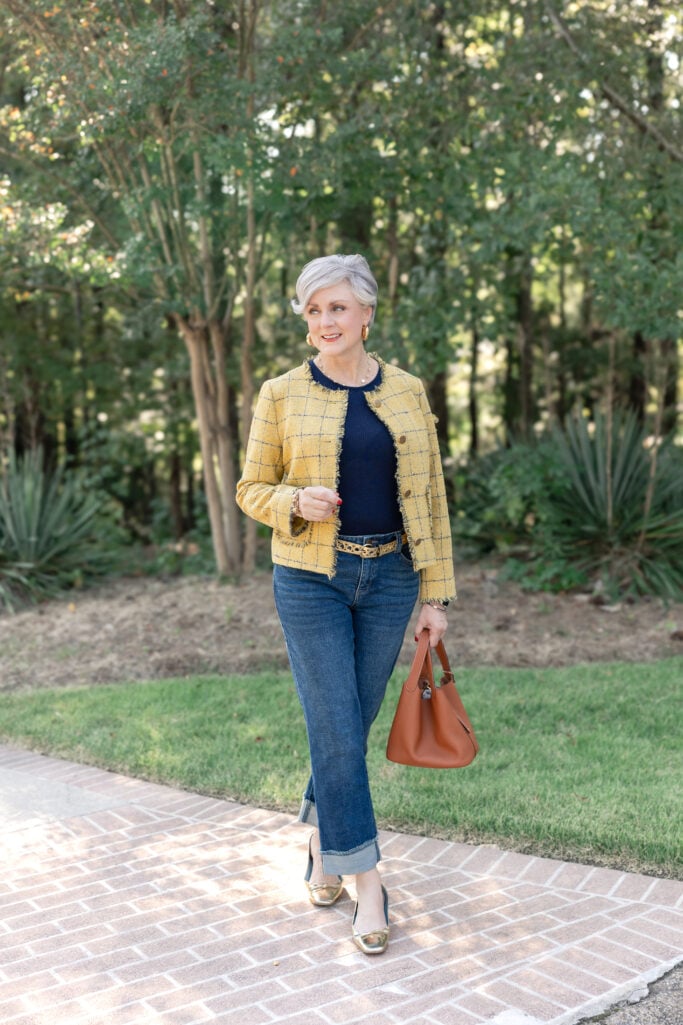 Beth Djalali showcasing effortless fall fashion, styled with a structured handbag and polished casual layers. Golden Moments Golden Bachelor