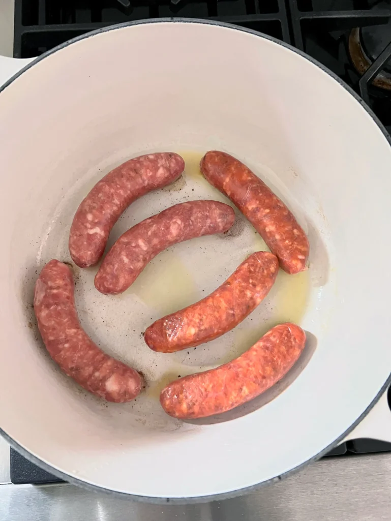 Brown the sausages