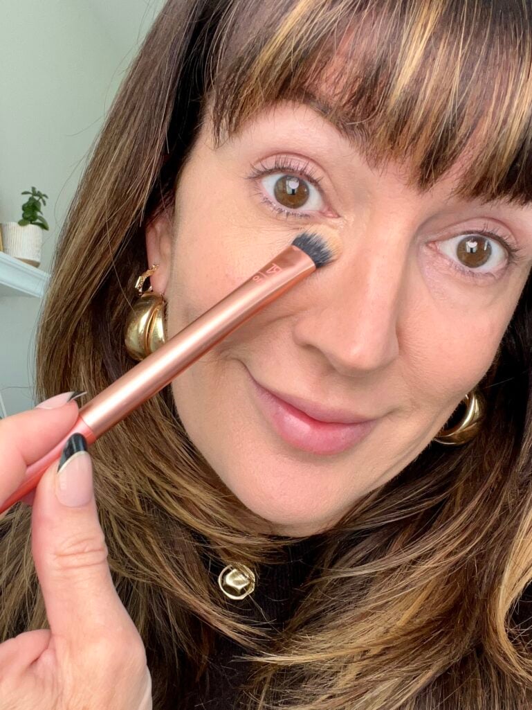 use a brush to smooth concealer