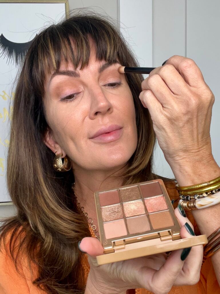 applying eyeshadow base