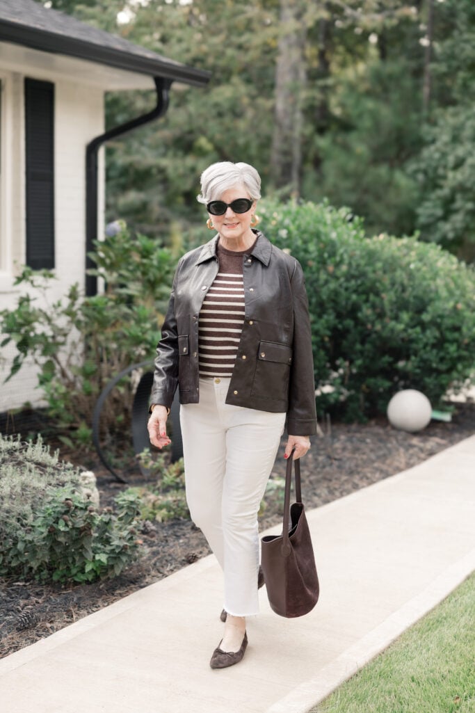How not to look frumpy and older. Beth Djalali wearing a modern faux leather jacket.