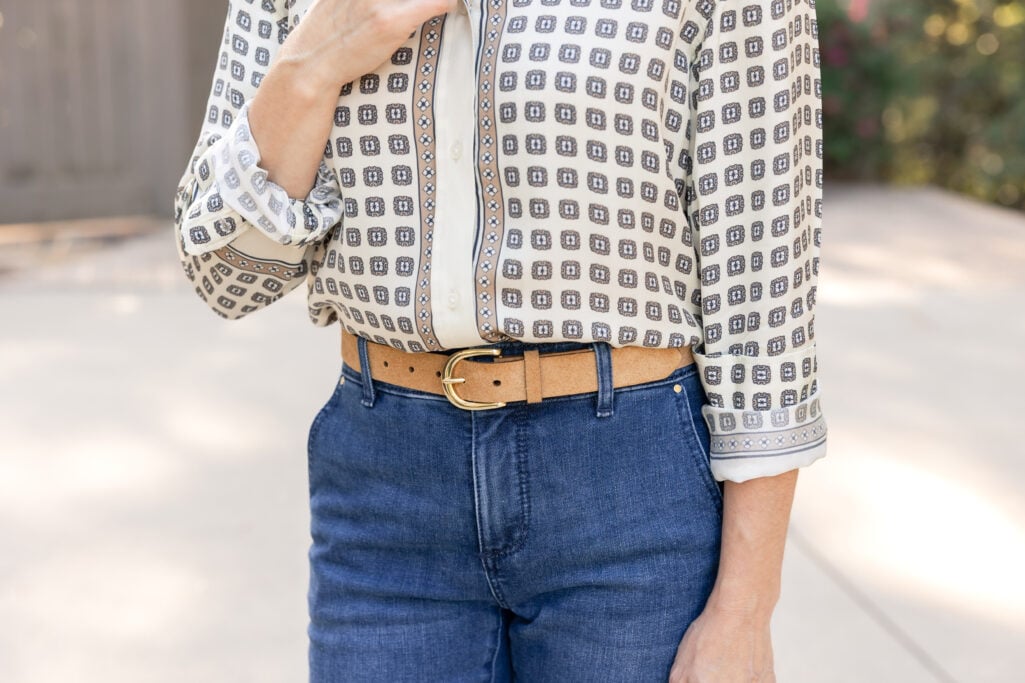 Close Up of the classic belt in suede, completing the petite denim look.