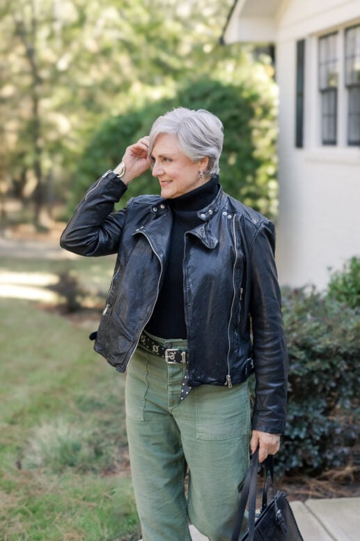 woman over 50 wearing leather jacket fall outfit