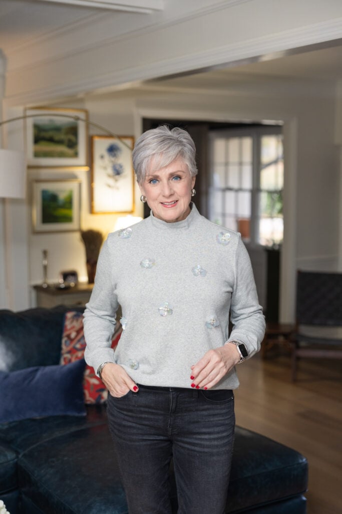 Over 50 woman styling a Talbots sweater and jeans