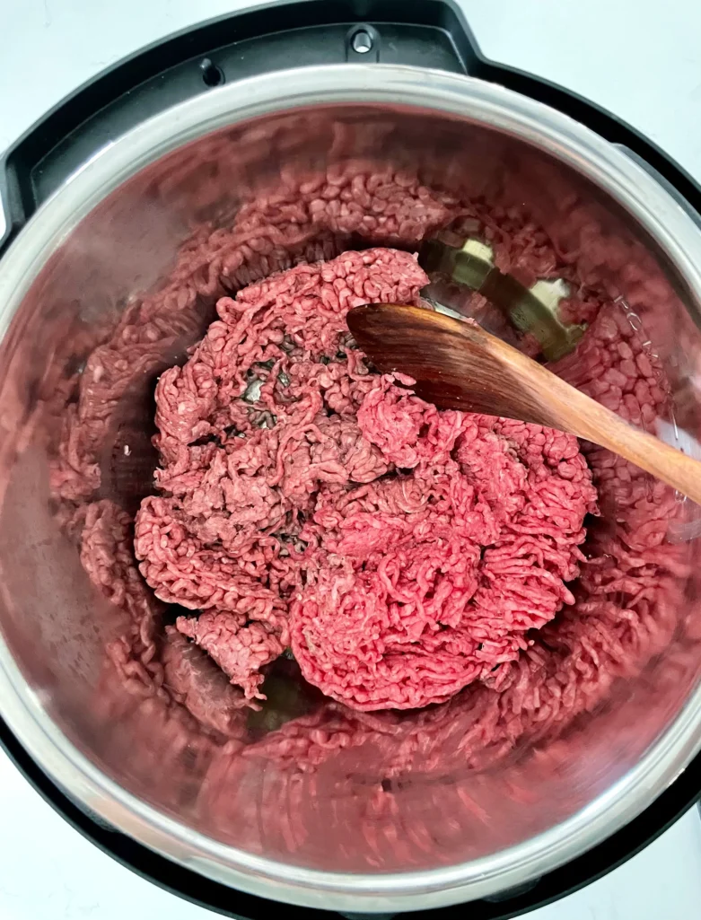brown the ground beef in the instant pot