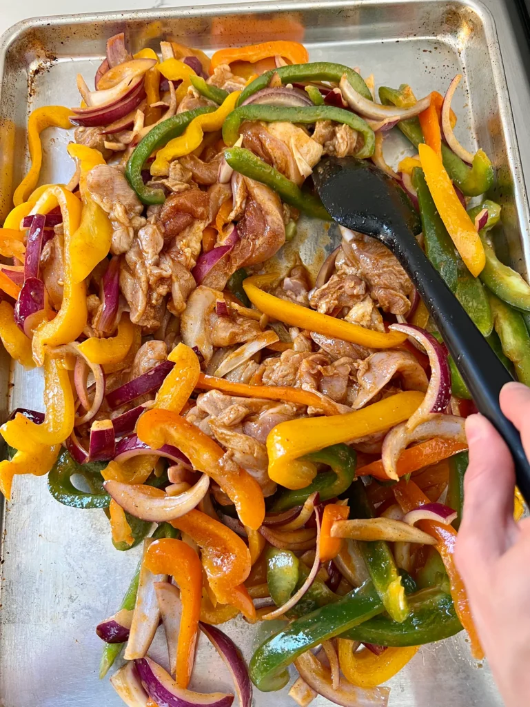 bake the marinated chicken and peppers