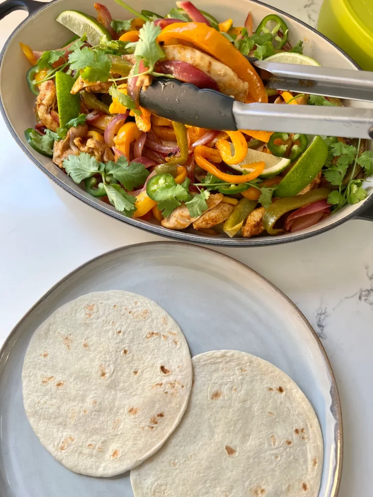serving the chicken fajitas