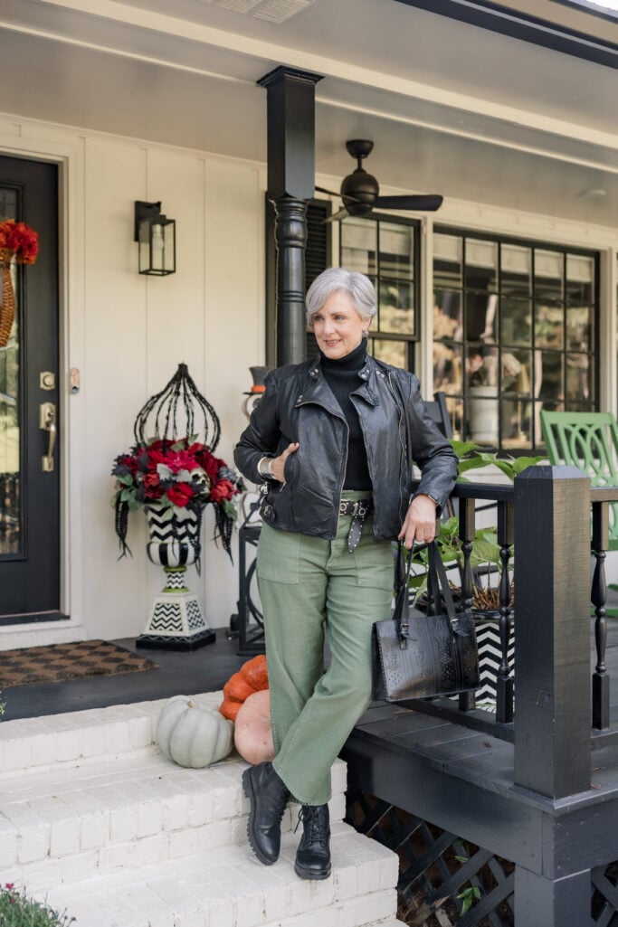 woman over 50 wearing leather jacket fall outfit