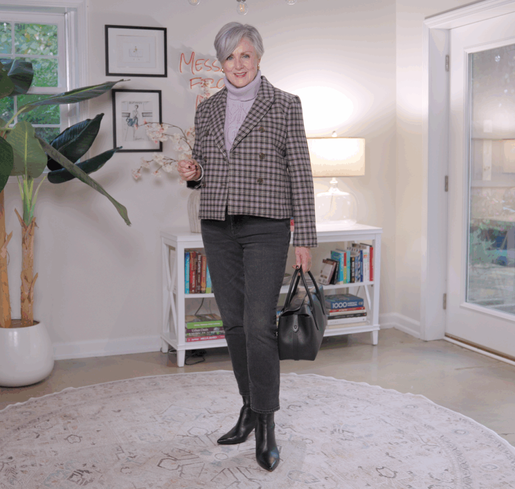 Plaid blazer with coated jeans and Chelsea boots — edgy fall outfit idea for women 50+.