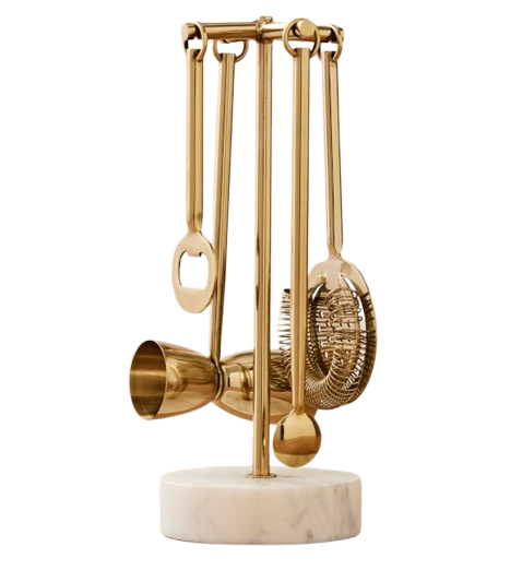 gold bar tools on marble base stand
