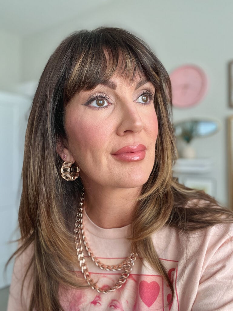 Woman showing the final full lip look