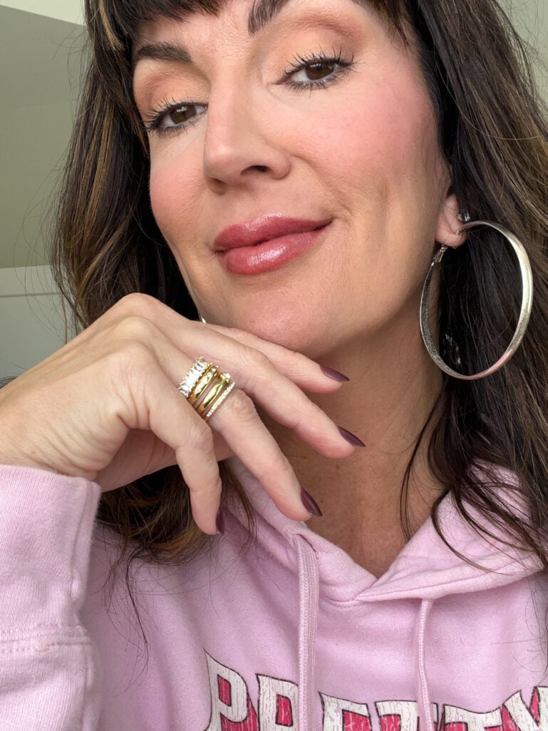 Jennifer models stackable rings from Bauble Bar