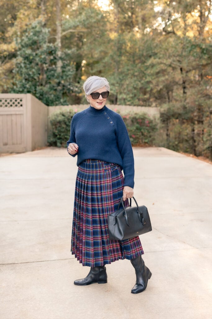 women over 50 navy sweater plaid skirt breaking fashion rules with confidence