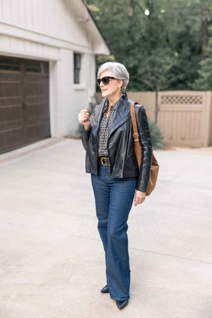 style rules women over 50 dark denim jeans and black leather jacket modern fall look