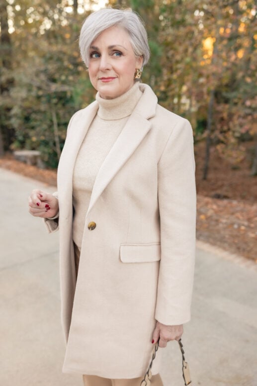 Beth Djalali wearing camel beige wide-leg trousers with matching turtleneck sweater and tailored blazer - wide leg pants outfit for women over 50