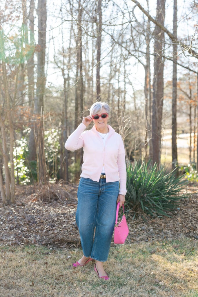 Beth in cropped wide-leg jeans with pink cardigan, white tee and pink bow-detail flats - casual wide leg jeans outfit for tall women over 50