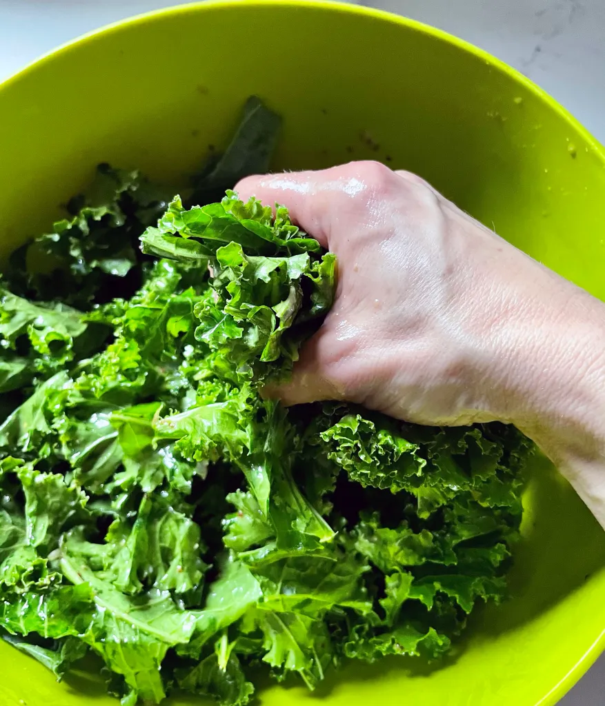 Massage kale with maple Dijon dressing