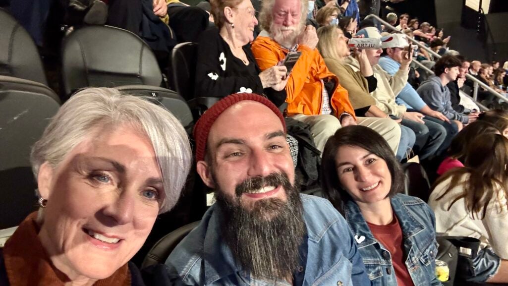 Beth Djalali with her son AJ and daughter-in-law at Paul McCartney Got Back Tour, laughing together before the show.