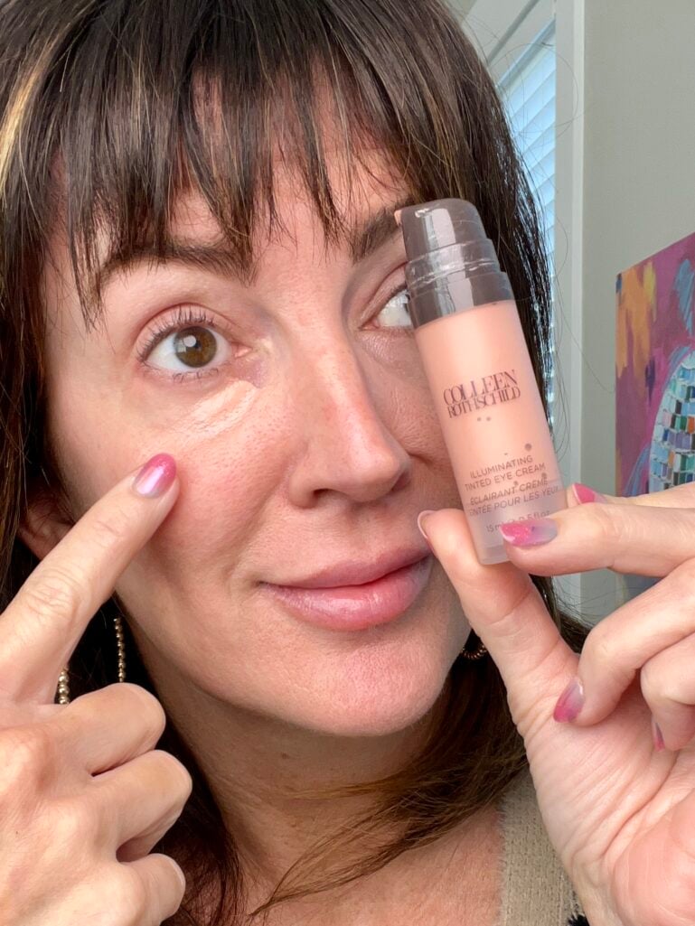 Jennifer applying Colleen Rothschild Illuminating Tinted Eye Cream under eyes - brightening eye cream for mature skin