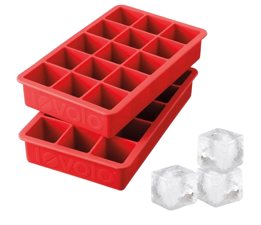 Tovolo red silicone ice cube trays with square compartments, shown with large clear ice cubes for cocktails and beverages.