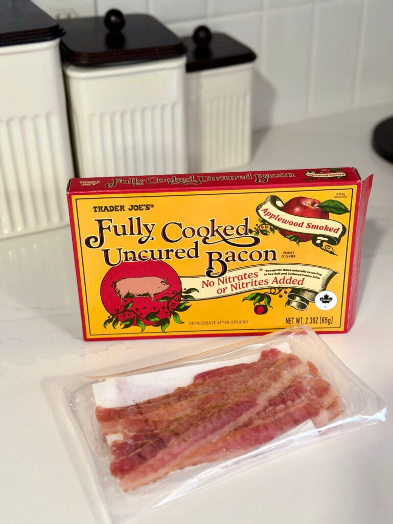 Trader Joe's Fully Cooked Uncured Bacon box with applewood smoked bacon strips