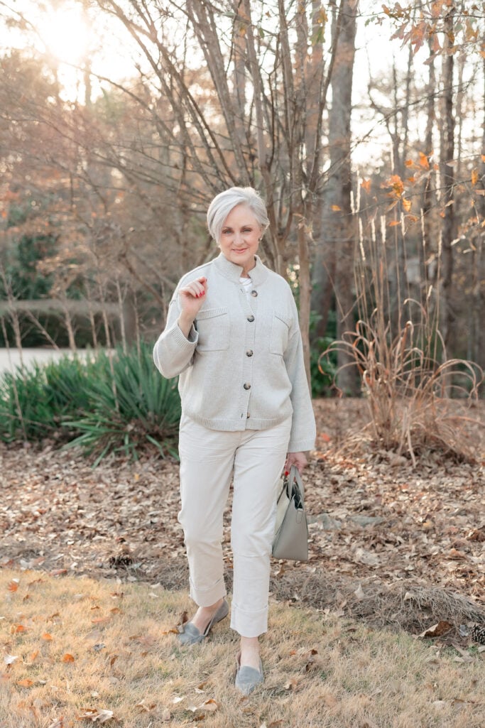 Polished casual winter outfit for women over 60 featuring soft layers and neutral tones