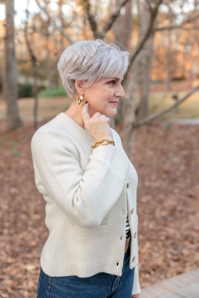 Close up of Beth wearing a cardigan