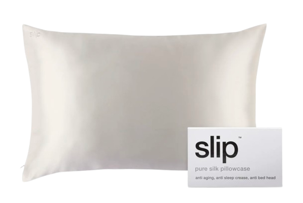 Slip pure silk pillowcase in a soft ivory shade, shown flat with branded tag, designed to reduce sleep creases, frizz, and hair breakage.