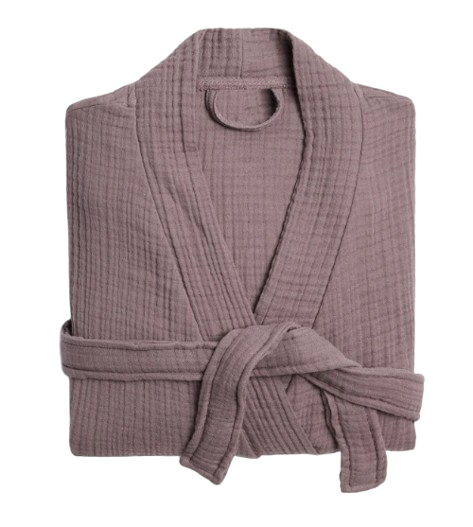 Parachute Cloud Cotton robe in a soft mauve shade, folded neatly with matching belt tied at the waist. Lightweight, textured cotton with a relaxed shawl collar and cozy spa-inspired silhouette.
