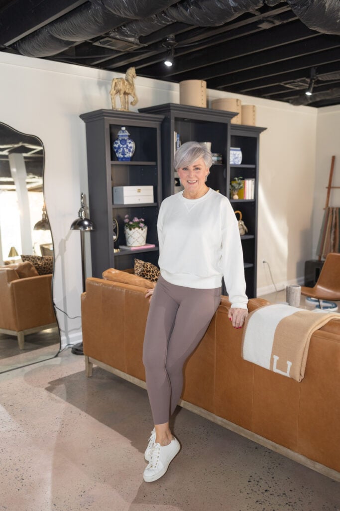 how to wear leggings after 50 — Spanx crewneck sweatshirt with Spanx Booty Boost leggings