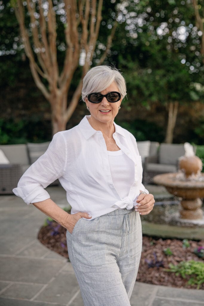 Travel day vacation outfit for women over 50 — linen pants and ribbed tank