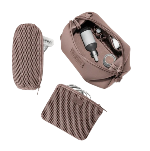 Taupe neoprene toiletry bag set with zip closures, shown open with travel-size skincare and beauty items neatly organized inside.