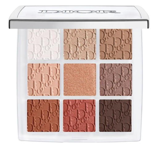 Open Dior eyeshadow palette with nine shades including primer, featuring neutral tones in matte and shimmer finishes like beige, taupe, bronze, and soft brown.