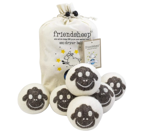 Set of wool dryer balls with sheep face designs, displayed with a fabric storage bag, used as a natural alternative to dryer sheets.